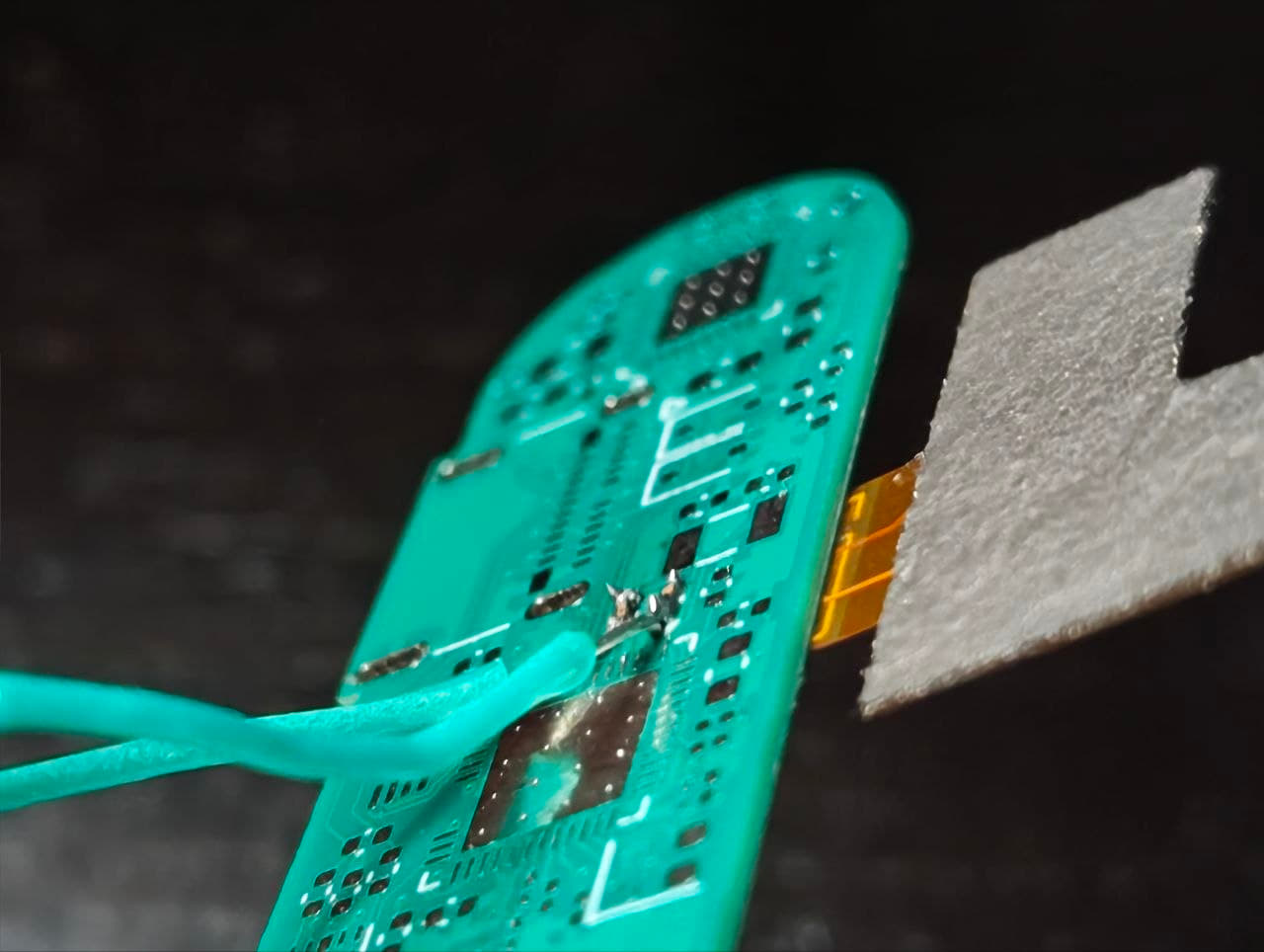 Prototype with the 0201 capacitors soldered by hand.
